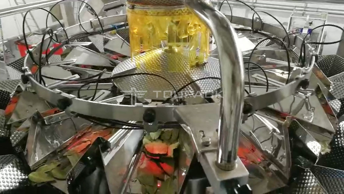 Machine d'emballage à pesée verticale entièrement automatique pour les feuilles de thé séchées