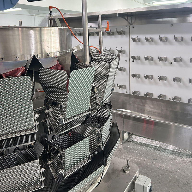 Système automatique de pesage et d'emballage de boîtes précis et efficace pour les steaks Ribeye